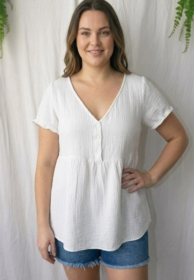 Blusa branca corte babydoll gaze de algodão texturizado "Kiabi" – photo 5